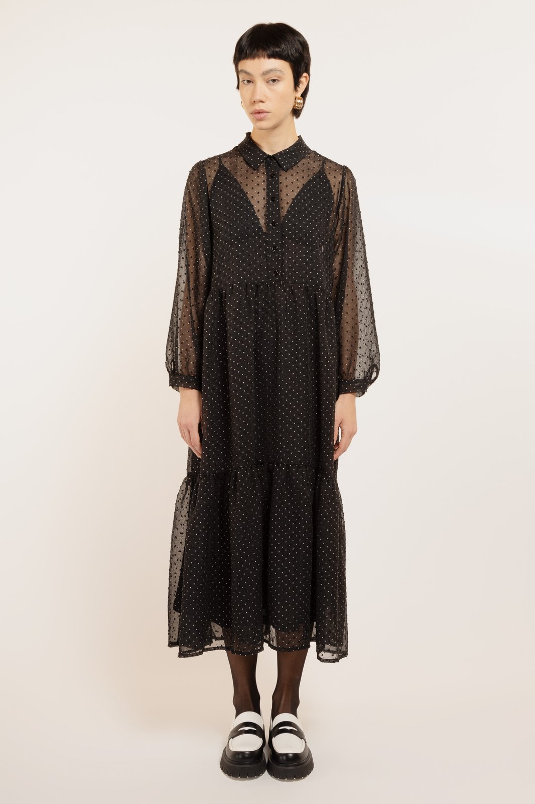 ABITO ALGERI PLUMETY NERO €240 - 50%