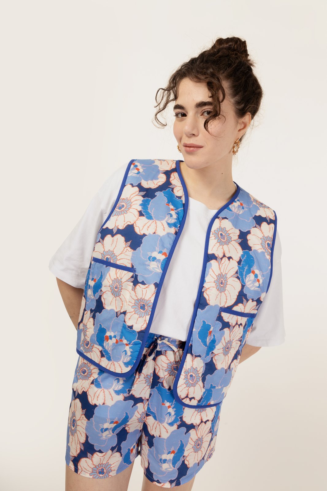 GILET CANDY ANEMONE BLU + WAVE GLICINE €199 - 50%